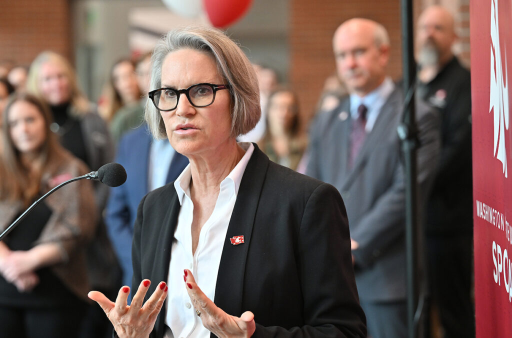 WSU President Elizabeth Cantwell addressing a crowd on the Spokane campus.