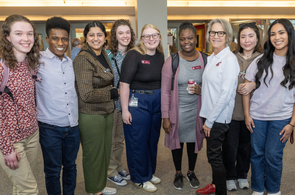 WSU President Elizabeth Cantwell poses for a group photo with members of the WSU Tri-Cities community.