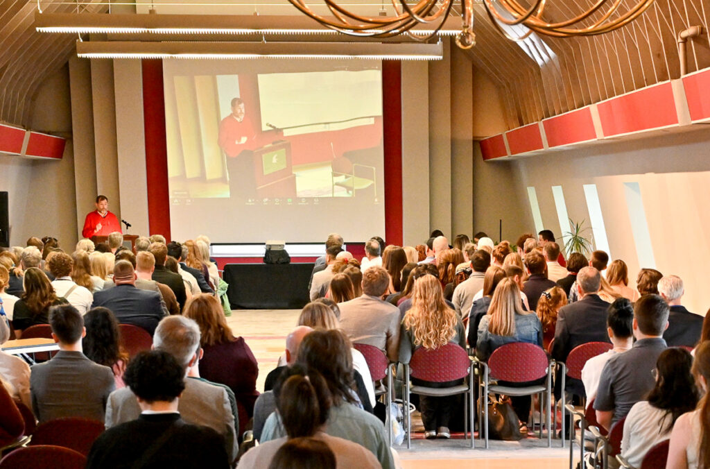 Riley-Tillman addresses a crowd seated for the 2025 DAESA Awards Ceremony.