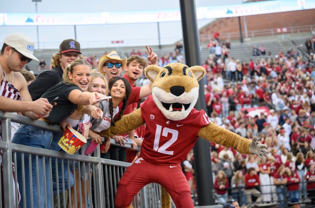 Butch celebrating with WSU football fans.