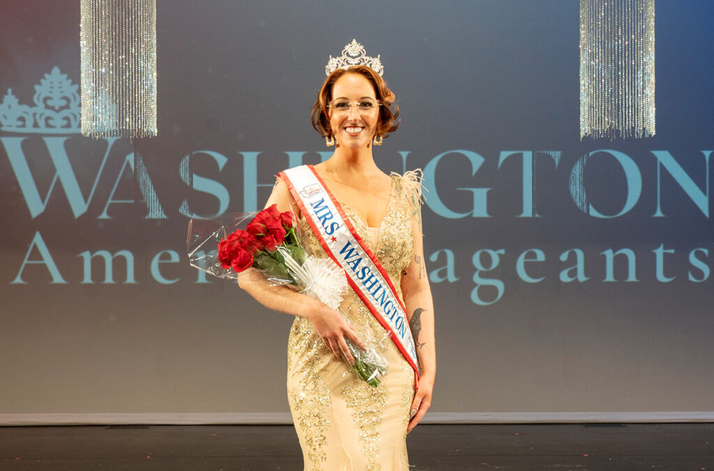 Closeup of Aly Heinrich on stage at the Mrs. Washington competition.