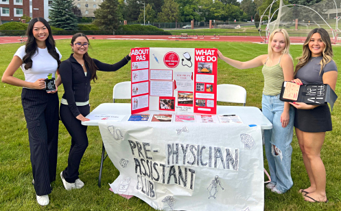 Members of the Pre-Physician Assistant Club present information about their organization on the WSU Pullman campus.