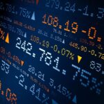 A stock market board is displayed.