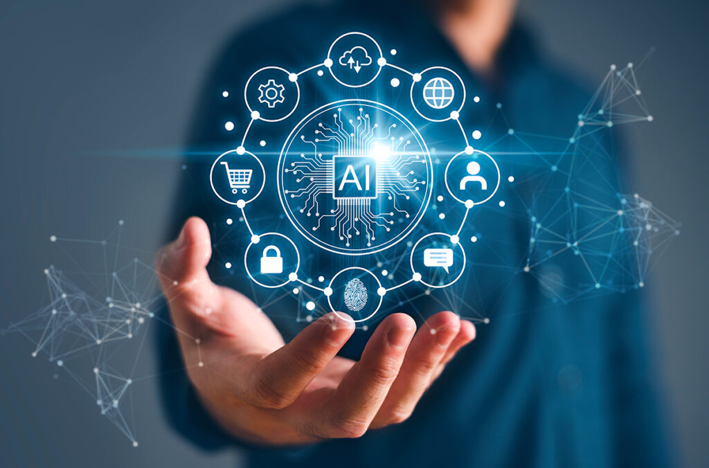 A composite featuring an outstretch hand and a collection of computer icons powered by AI.