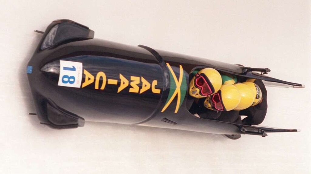 Members of Jamaica’s 1988 Olympic four-man bobsled team taking a run at the 1988 Winter Games in Calgary.