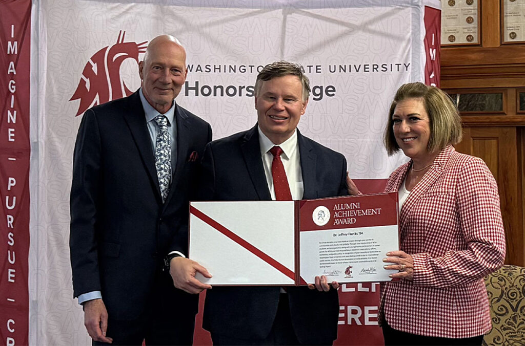 Jeffrey Franks being presented with the WSU Alumni Achievement Award.