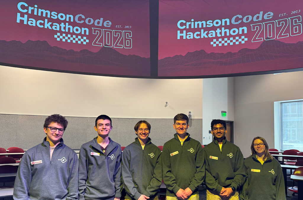 Six students, all organizers of CrimsonCode Hackathon 2026, pose for a group photo.