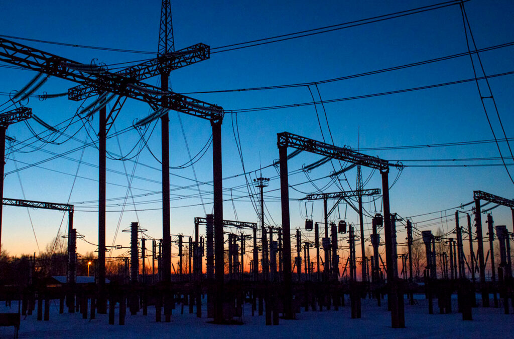 An electrical substation at dusk.