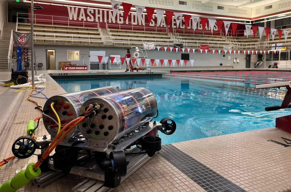 Guppy, the Palouse RoboSub's submarine, stationed on the side of Gibb Pool.