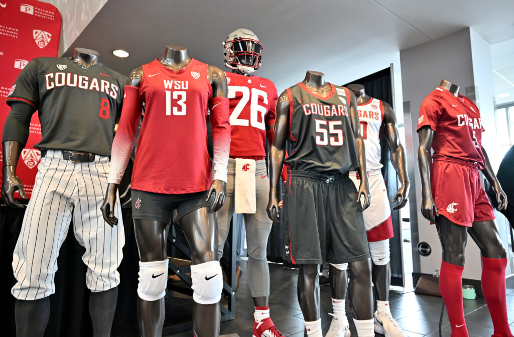 Mannequins featuring WSU athletic uniforms with Colville Tribe jersey patches.