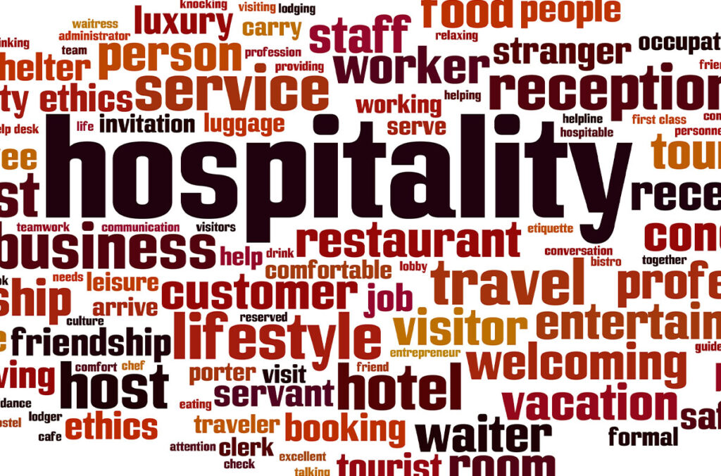 A word cloud centered on the term “hospitality,” with surrounding words like welcome, service, guest, hotel, tourism, restaurant, concierge, staff, accommodation, reception, travel, and professionalism, visually emphasizing themes related to the hospitality industry.