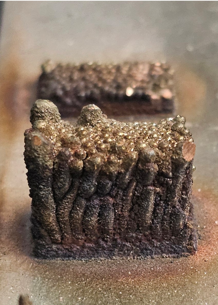 Failed GRCop-42 print attempt used to train the AI feasibility model. Photo by Nathaniel W. Zuckschwerdt / WSU.