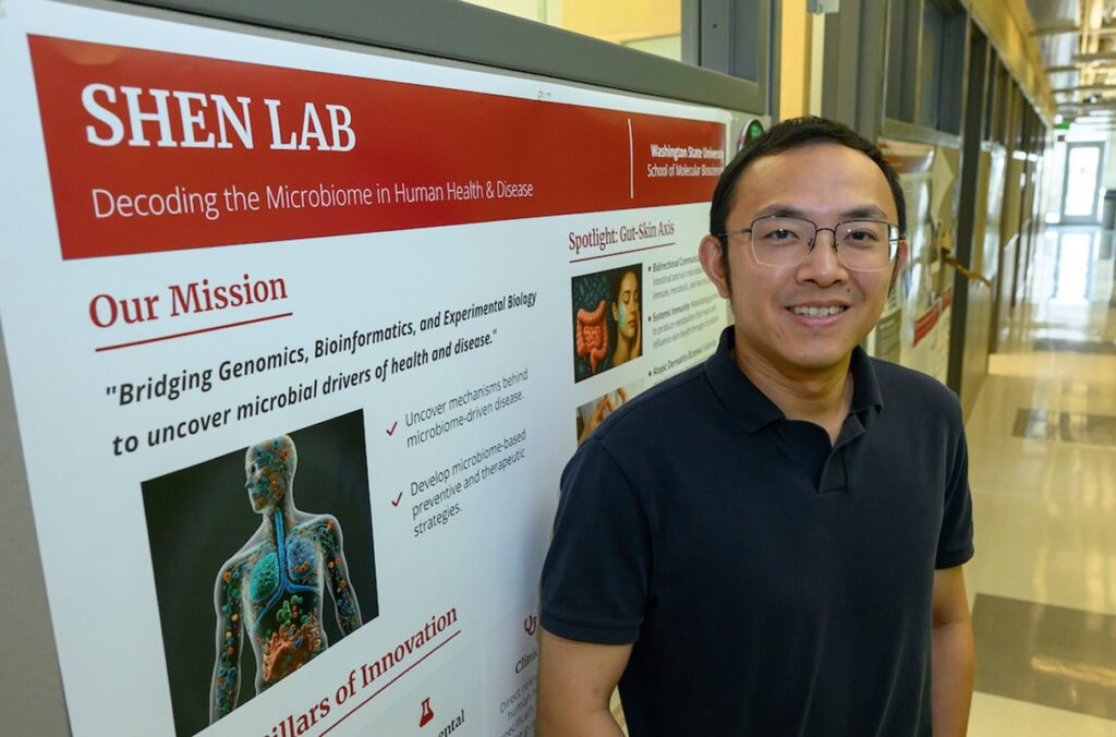 Zeyang Shen poses outside his research lab.