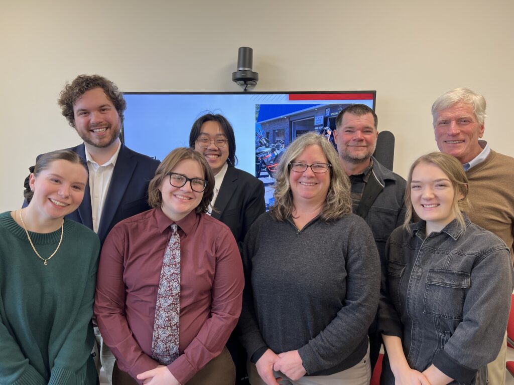 Left to right: Alexander Dominici, Vy Tran, Abigail Durrent, Eric Morton (owner of Mortons Barbecue & Catering), Daniel Robu, Connor Loewen, Cirith Anderson (mentor), Nishita Naresh.