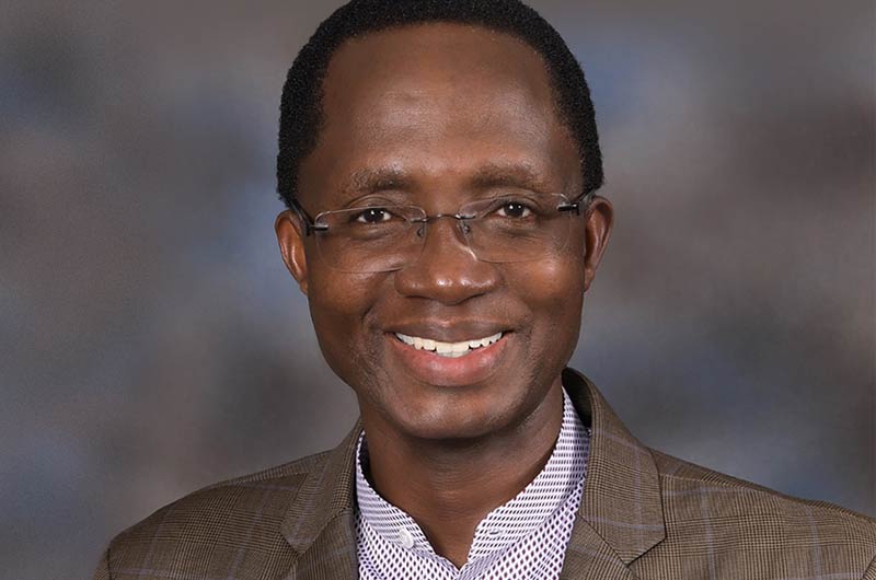 Portrait of Dr. M. Kariuki Njenga
