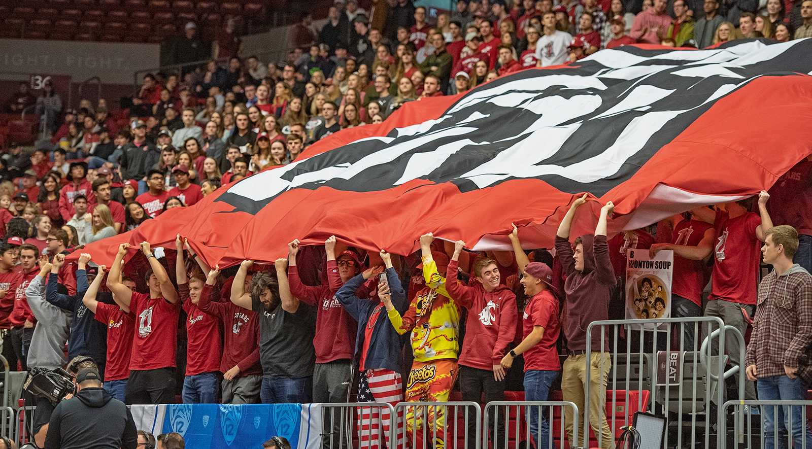 Fans celebrate during the WSU Men's Basketball vs Arizona on the campus of Washington State University, Saturday, February, 1, 2020.