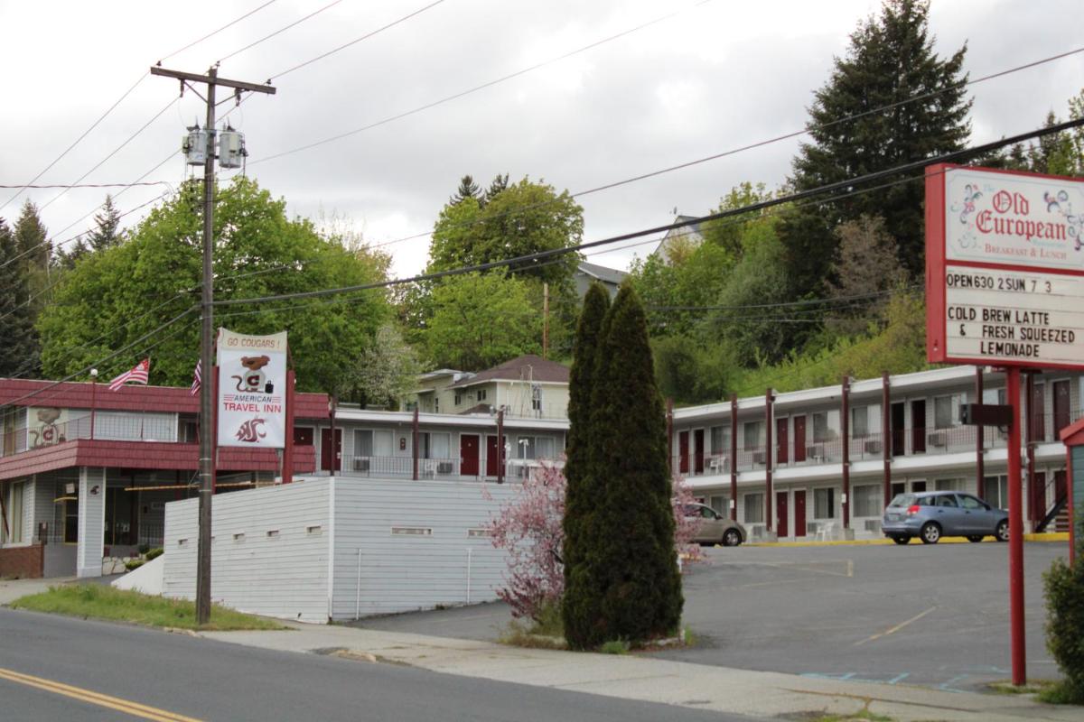 A motel next to a restaurant.