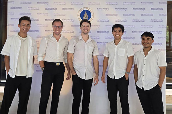classmates in their school uniforms on the last day of classes at Mahidol University
