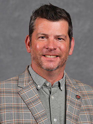 Headshot of Andrew Perkins.