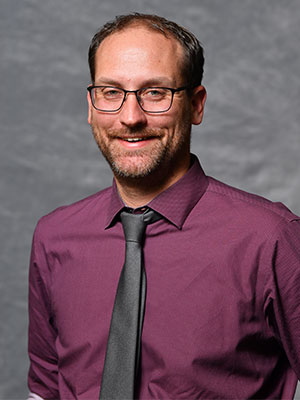 Headshot of Jake Schlosser.