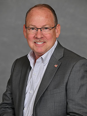 Headshot of Patrick Dooley.