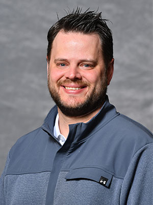 Headshot of Ricky Waldron.