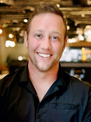 Headshot of Devin Ossman.