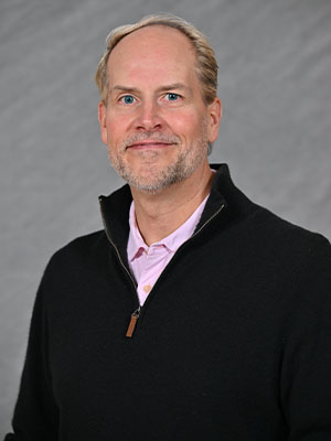 Headshot of Gus Monson.