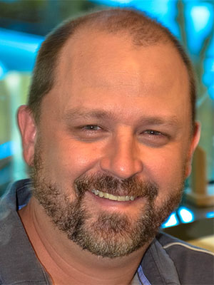 Headshot of Brett Flynn.