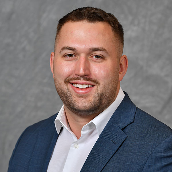 Headshot of Adam Bozman.