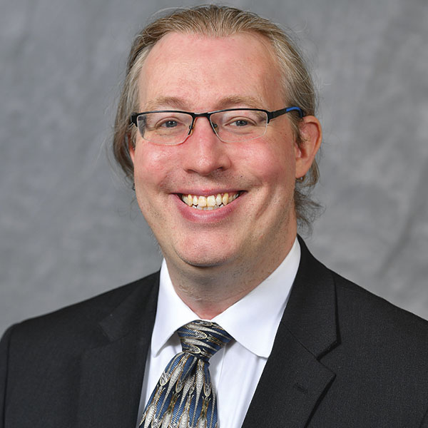 Headshot of Kevin Mayo.