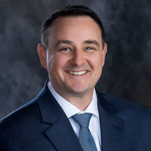 Headshot of Brian Lewis.