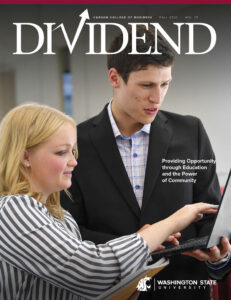 Cover of Dividend Magazine Fall 2021, Volume 35, featuring two individuals collaborating on a laptop. The headline reads “Providing Opportunity through Education and the Power of Community,” with Washington State University logo at the bottom.