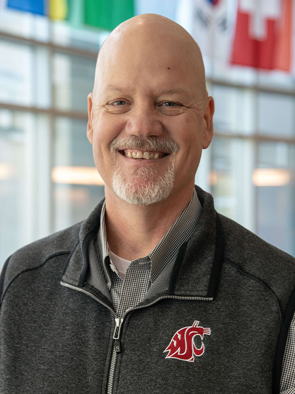 Headshot of Mark Schuster.