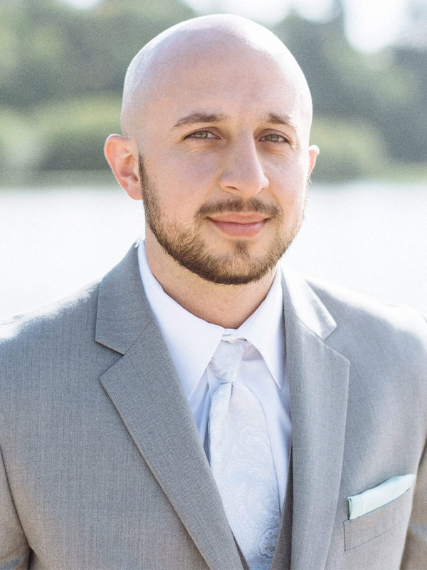 Headshot of Ryan Frost.