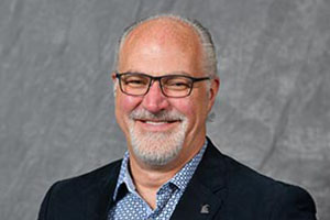 Headshot of Ronald Moser, MA.