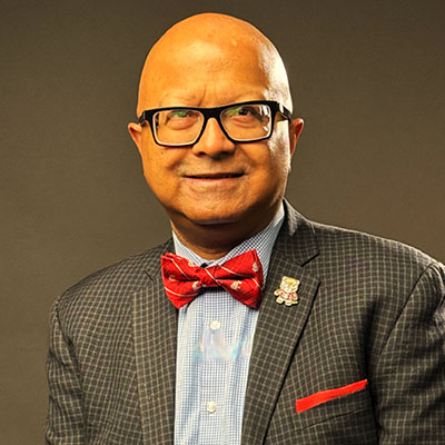 Headshot of Dipra Jha.