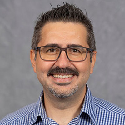 Headshot of Mesut Cicek.