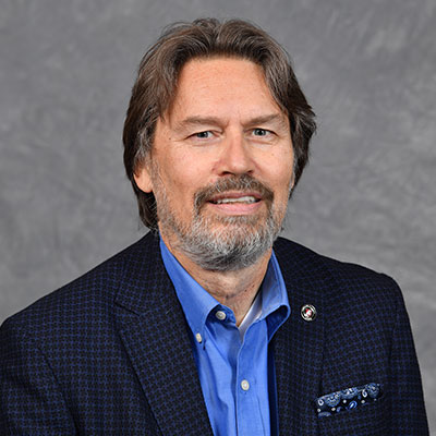 Headshot of Joe Compeau.