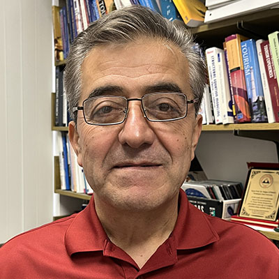 Headshot of Dogan Gursoy.