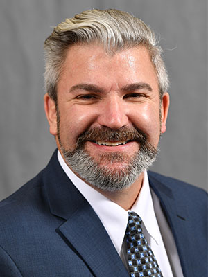 Headshot of Chris Cooney.