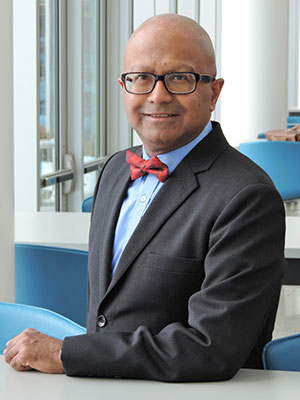 Headshot of Dipra Jha.