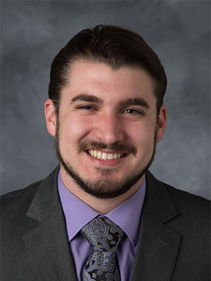 Headshot of Corey Sutter.