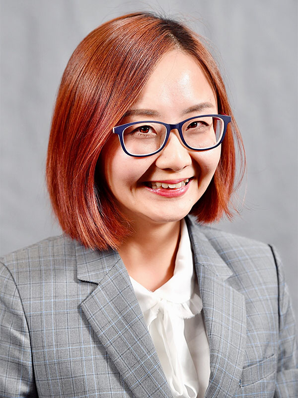 Headshot of Demi Deng.