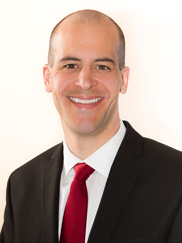 Headshot of Troy Braga.