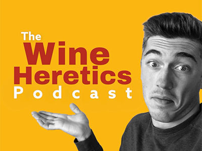 Wine Heretics podcast graphic, featuring the title in bold red text on a yellow background with Jack Costa and his outstretched hand beside it.