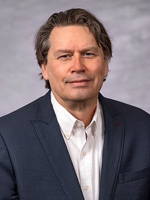 Headshot of Joe Compeau.