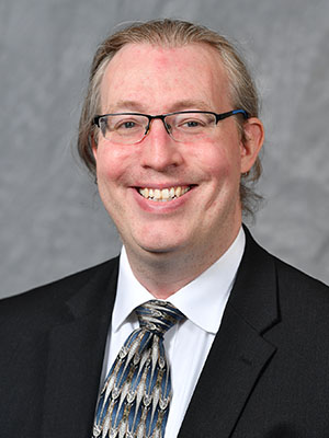 Headshot of Kevin Mayo.