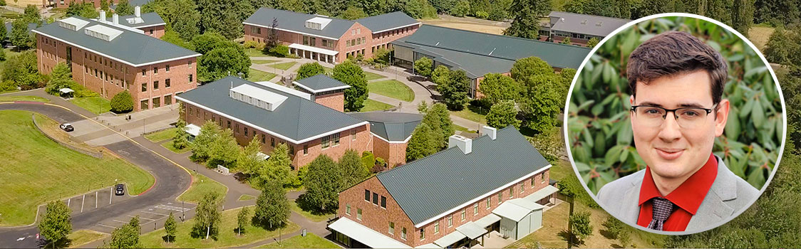 Aerial view of a campus with multiple brick buildings surrounded by trees, shown alongside a portrait of Dan Mauk wearing a light gray jacket and red shirt.