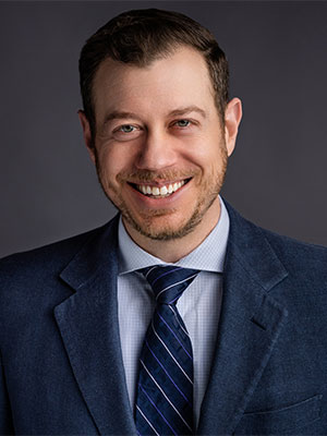 Headshot of Tag Jacklin.